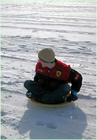 Op de slee in de sneeuw
